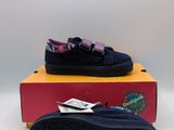 the children ' s shoes are in a box on a white surface