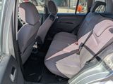 a car that has two seats in the back of it