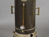 a small stove that is sitting on top of a table