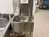 a stainless steel sink and a stainless steel sink in a kitchen