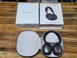 a box with a pair of headphones in it on a table