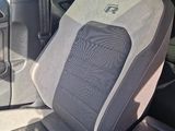 a car that has a seat cover on the back of it