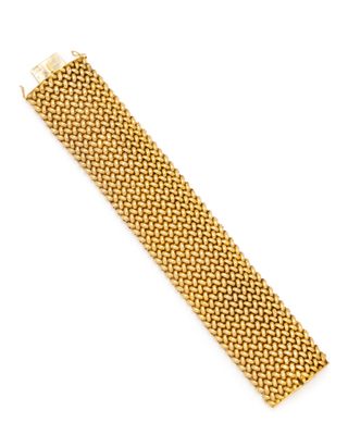 a gold bracelet with a clasp on a white background