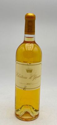 a bottle of wine that is sitting on a table