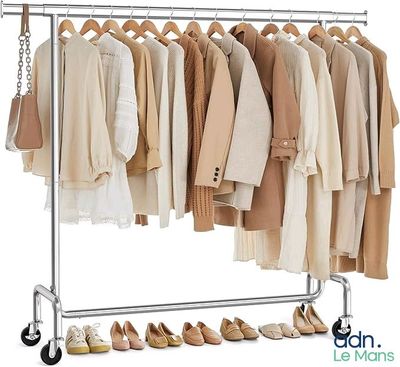a picture of a rack with clothes and shoes on it