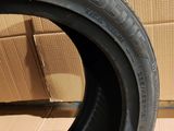 an image of a close up of a tire on a cardboard box