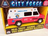 two toy ambulances in the box on the table