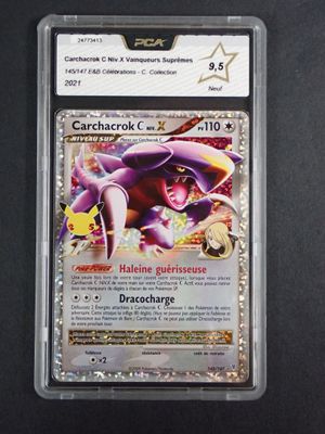 a close up of a card in a plastic holder on a table