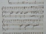 a black and white image of a sheet of music with notes