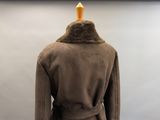 an image of a brown coat with a fur collar on a mannequin