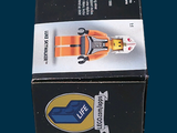 a box with a lego figure inside of it on a blue background