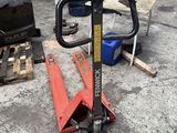 an image of a forklift in a parking lot
