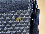 a blue bag with a yellow and white pattern on it