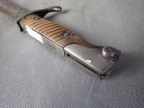a knife that is laying on top of a table
