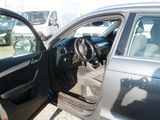 a car that has a door open on the side of the road