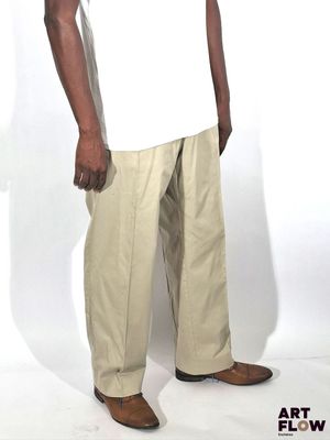 a man that is standing in front of a white background