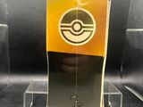 a close up of a clear display case with a pokemon logo on it