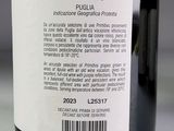 a close up of a bottle of wine with a barcode on it