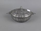 an antique silver plate covered casserole with a lid