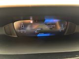 a car dashboard with a digital display on it
