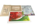 many different pictures of a fish on a table