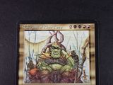 a picture of a card that has a picture of a troll on it