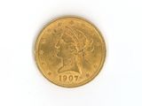 l'image d'une pièce d'or sur laquelle figure une tête de femme