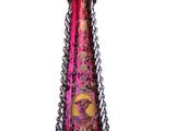purple glass vase with a gold and pink design on the bottom