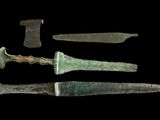 several different types of knives are displayed on a black background