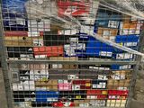 a cart full of boxes and boxes wrapped in plastic