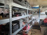 a room filled with lots of clutter and tools