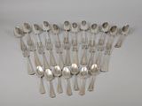a lot of spoons and spoon spoons on the table