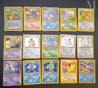 the pokemon cards are lined up on a black surface