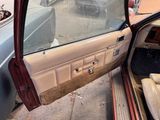 a car that has a door open on the side of the road
