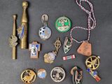 several different types of medals and other items on a table