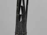 an image of a pipe holder made out of bamboo sticks