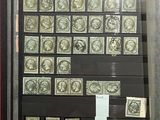 a picture of a collection of stamps in a display case