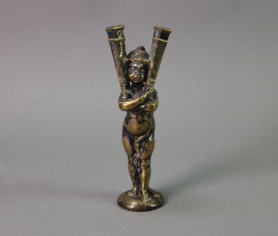 an image of a statue of a woman holding two vases