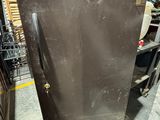 an image of a refrigerator that is in a warehouse