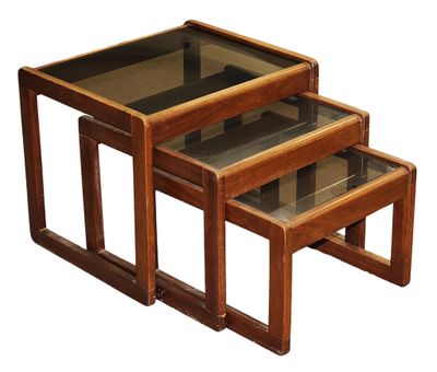 three wooden nesting tables with glass tops on a white background