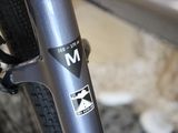 a close up of a bike with a sticker on it