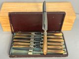 a box with a set of knives inside of it