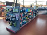 a store with a lot of items on the shelves