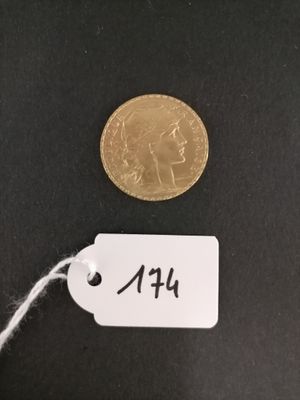 a close up of a coin with a price tag attached to it