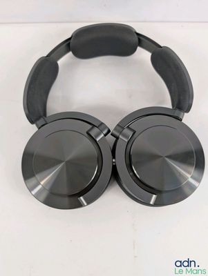 a close up of a pair of headphones on a white surface