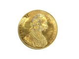 l'image d'une pièce d'or sur laquelle figure le portrait d'un homme