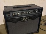 a close up of a guitar amplifier sitting on top of a table