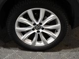 a close up of a tire on a car