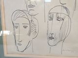un dessin représentant un homme et une femme, exposé