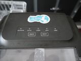 a close up of a printer with a sticker on it